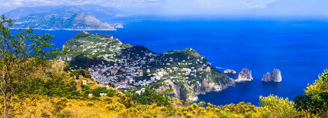 most scenic island of Italy and popular resort - beautiful Capri. panoramic view woth famous...