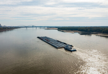 Extreme low water conditions on Mississippi river under Hernando de Soto bridge in Memphis TN as...