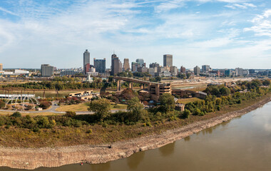 Fototapeta premium Panoramic view of Memphis Tennessee cityscape with low water levels in the Mississippi river and Wolf River Harbor
