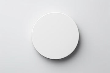 top view of white badge float on white background. Glossy round button. - obrazy, fototapety, plakaty