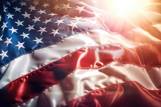 A close up view of an American flag with the sun shining in the background. This patriotic image is perfect for showcasing national pride or celebrating American holidays