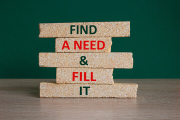 Concept red words Find a need and fill it on brick blocks. Wooden table, beautiful green...