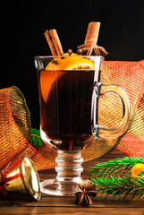 Mulled wine and spices on wooden background.  - 686280812
