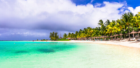 Paradise tropical beach scenery. relaxing holidays in Mauritius island with white sands and turquoise sea
