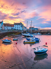 Fototapeta premium Sunrise over St Monans village harbour in Fife, Scotland 