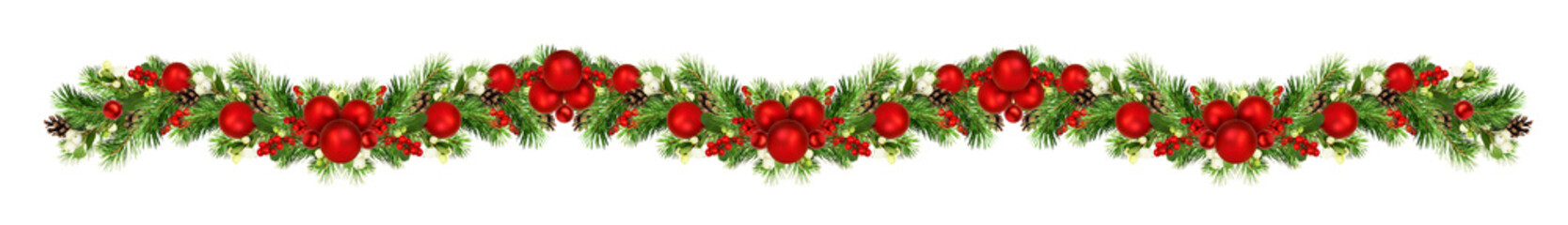 Snowberries with green twigs of Christmas tree, red decorations and cones in a holiday waved garland isolated on white or transparent background