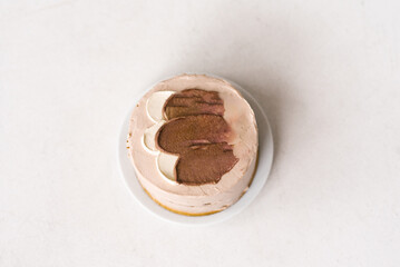 Coffee chocolate bento cake on white background