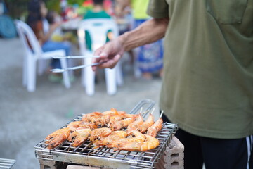 Asian, American and African family parties with grilled seafood and beer drinks, BBQ
