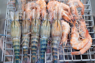 Asian, American and African family parties with grilled seafood and beer drinks, BBQ