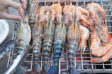 Asian, American and African family parties with grilled seafood and beer drinks, BBQ