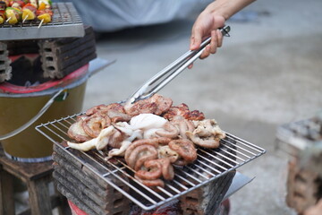 Naklejka premium Asian, American and African family parties with grilled seafood and beer drinks, BBQ