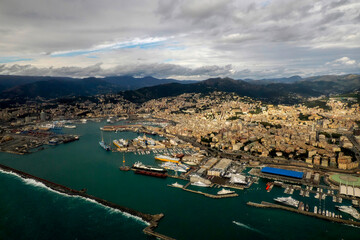 Foce Genoa aerial view before landing to airport by airplane during a sea storm tempest hurricane