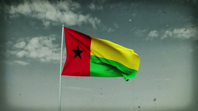 guinea-bissau flag waving on sky background. 4K Highly Detail 3D Rendered video footage for national or government activity, patriotism and  social media content.