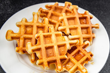 sweet waffles delicious dessert Belgian waffles healthy eating cooking appetizer meal food snack on...