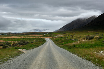 Dirt road in the mountains to mt Sunday in new zealand