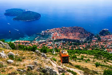 Fotobehang medieval Dubrovnik town - pearl of Adriatic coast in Croatia. Dalmatia. view of cable car and the island © Freesurf