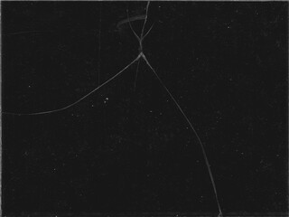 Texture of broken glass with scratches on black background for Y2K style work and creating crack...