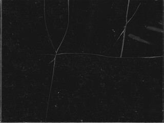 Texture of broken glass with scratches on black background for Y2K style work and creating crack...