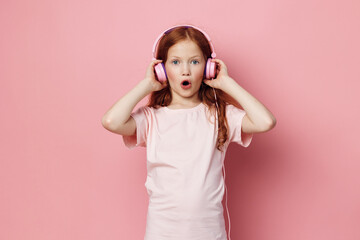 Sound girl small background headphone young enjoying cute listen kid little music children childhood