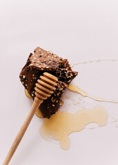 Photo of chocolate, Chocolate bar, honey and spoon 