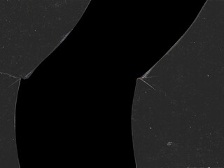 Texture of broken glass fragments with scratches and black background space for mockups for Y2K...