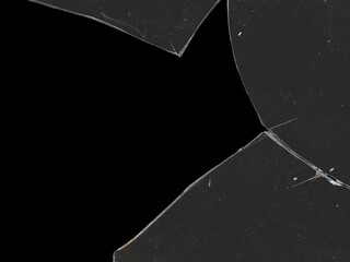 Texture of broken glass fragments with scratches and black background space for mockups for Y2K style work and creating crack effects for aged retro grunge style