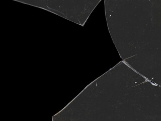 Texture of broken glass fragments with scratches and black background space for mockups for Y2K...