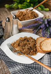 Bigos - sauerkraut stewed with meat, dried mushrooms and sausage.