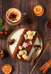 Homemade winter dessert, stollen or strudel with sweet cream filling, nuts, cinnamon and eggnog. Concept for holiday bakery, seasonal treats and cafe advertising,
