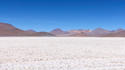 Bolivia, Avaroa National Park. Desert and mountain range on the horizon.