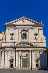 Fototapeta na wymiar Front facade of the church of Santa Maria in Vallicella on a sunny day with blue sky, Rome, Italy. 