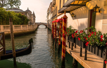 Old bridge city canal grande in Venice Italy old town romantic light with gondola