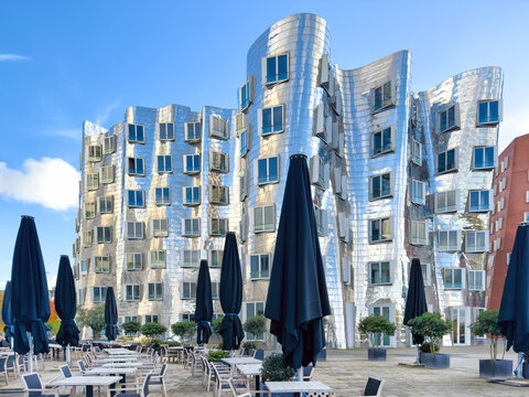 Duesseldorf, Germany, 2023:The Neue Zollhof , Unterbilk, is a striking landmark of the Duesseldorf harbour, the part of the harbour was designed by the Canadian-American architect Frank O. Gehry.