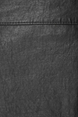 clothing details and decorative elements, pockets and seams, black fabric, textiles