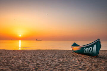 2024 New year concept Fishing Boat on Varna beach shore on sunrise