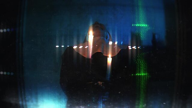 Insane nun holding burning candles and laughing, distorted tv screen effect