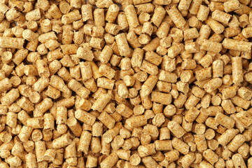 Wooden filler for cat litter close up for background