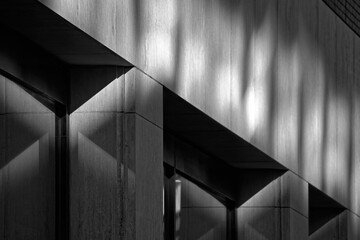 Fine art black and white monochrome photography, minimal architectural detail of diagonal support...