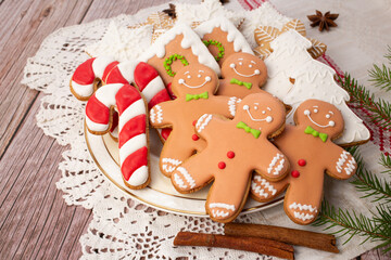 Christmas bake tools on flour and rustic wooden background, flat lay.Copy space