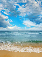Fototapeta na wymiar Bright ocean landscape. Sea waves and beautiful sky