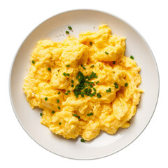 Creamy scrambled eggs garnished with chives on a white dish.