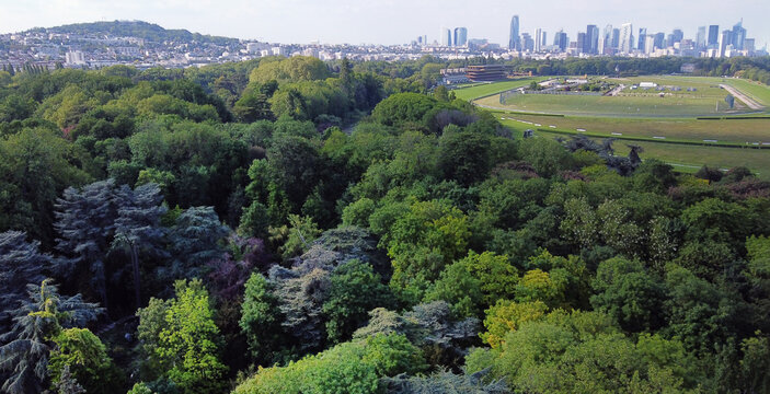 Amazing drone view on Park of Edmond  de Rothschild, part of Boise de Bo8ulogne and La Defense business district
