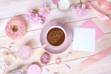 Coffee cup, donut, sakura flowers, aromatic candles on white wooden table, traditional coffee ceremonies and cultural aspects, Relaxation and coziness, Coffee Time, Aromatherapy