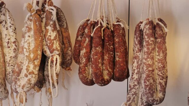 Homemade uncooked black blood spanish sausages on festival market, traditional food in spain