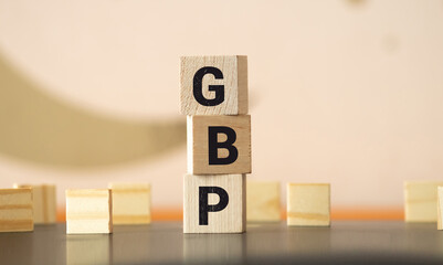 Start word concept, text GBP on wooden block