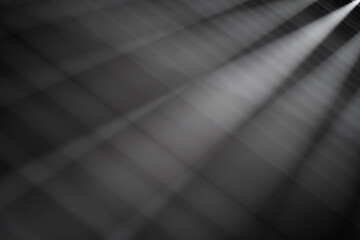 Diagonal row with light rays from spot lights abowe. Abstract copy space background.
