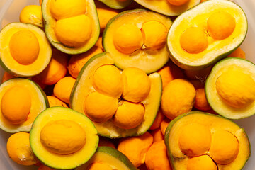Ripe Pequi fruit (Caryocar brasiliense), wild fruits typical of the Brazilian cerrado biome.