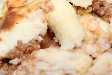 pieces of a dish made of potatoes and meat called Madalena. meal details. food details.