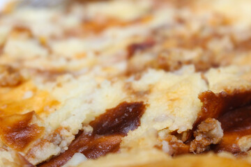 smashed of a dish made of potatoes and meat called Madalena. meal details. food details.