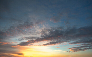 Naklejka na ściany i meble Beautiful sky background - Sunset Sunrise sky with light clouds and real sun.